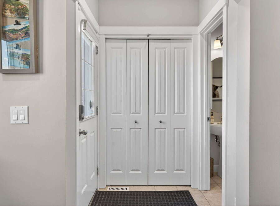 Step into this inviting entryway, featuring a bright and airy atmosphere.