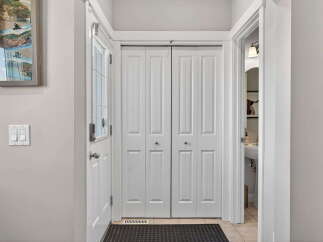 Step into this inviting entryway, featuring a bright and airy atmosphere.