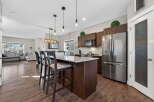 This stunning kitchen boasts a modern design with a spacious island, perfect for entertaining.