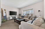 This stunning living room offers a comfortable and inviting space for relaxation and entertainment.