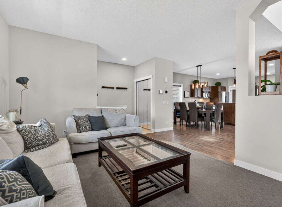 Step into this inviting living space, perfect for relaxation and entertaining.