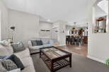 Step into this inviting living space, perfect for relaxation and entertaining.