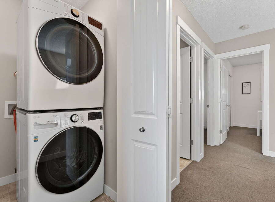 Discover the convenience of in-unit laundry with this stunning property! This home features a modern stacked washer and dryer, perfect for effortless chores.