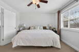 This inviting bedroom showcases a cozy and comfortable atmosphere, perfect for relaxation.