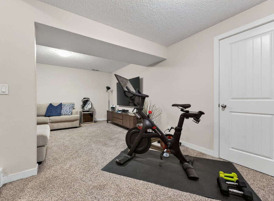 This home gym offers a dedicated space for fitness enthusiasts.