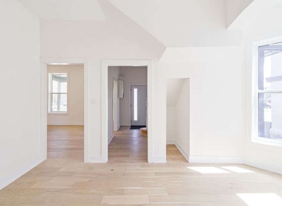 Step into this bright and airy home with pristine white walls and beautiful hardwood floors.