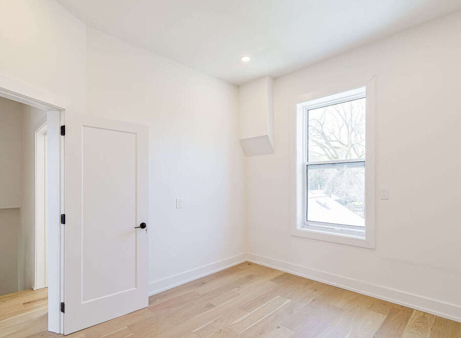This bright and airy room features a modern design with clean lines and neutral tones.