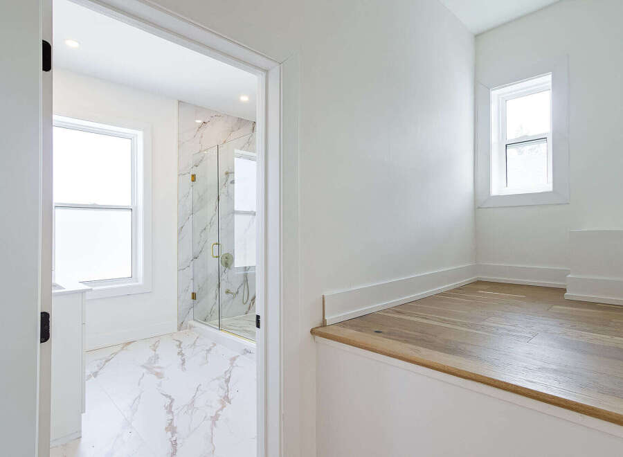 Step into a beautifully designed bathroom with a modern aesthetic.