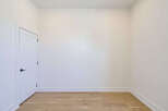 Step into this bright and airy space, perfect for a home office or a cozy reading nook.