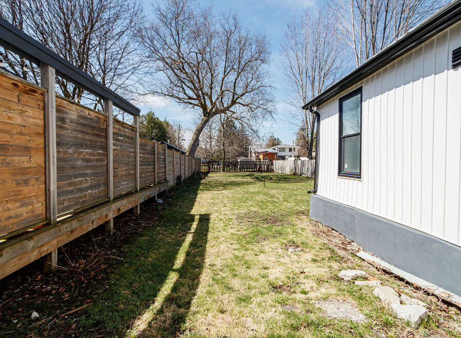 Discover the charm of this property, featuring a beautifully maintained backyard.