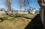 Discover the potential of this spacious backyard, perfect for creating your dream outdoor oasis.
