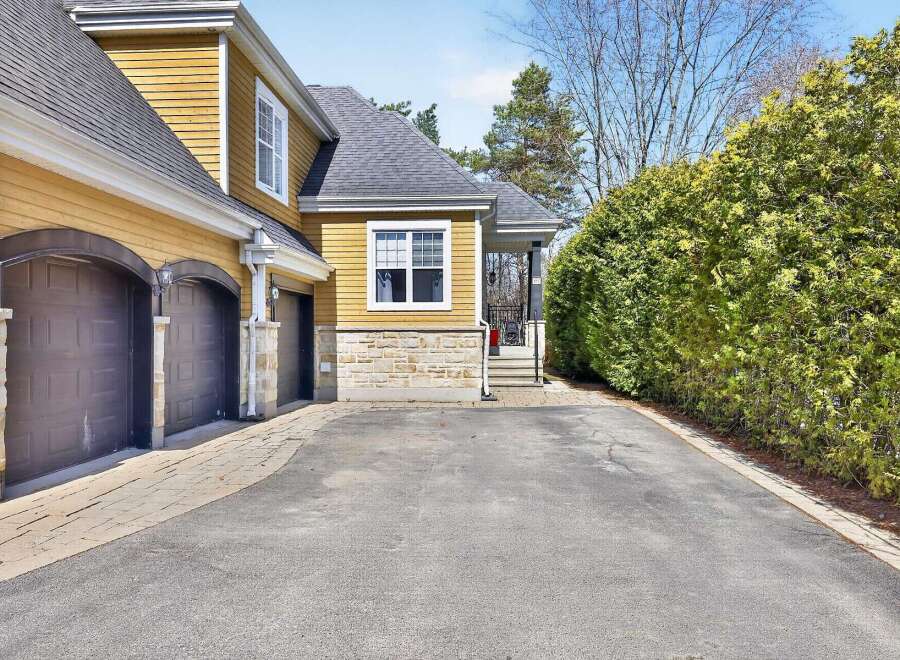 Discover this stunning property featuring a beautiful exterior with a charming facade and a well-maintained driveway.