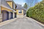 Discover this stunning property featuring a beautiful exterior with a charming facade and a well-maintained driveway.