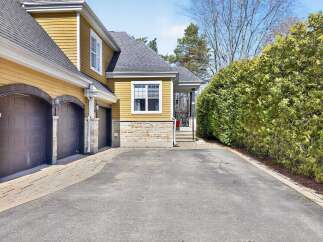 Discover this stunning property featuring a beautiful exterior with a charming facade and a well-maintained driveway.