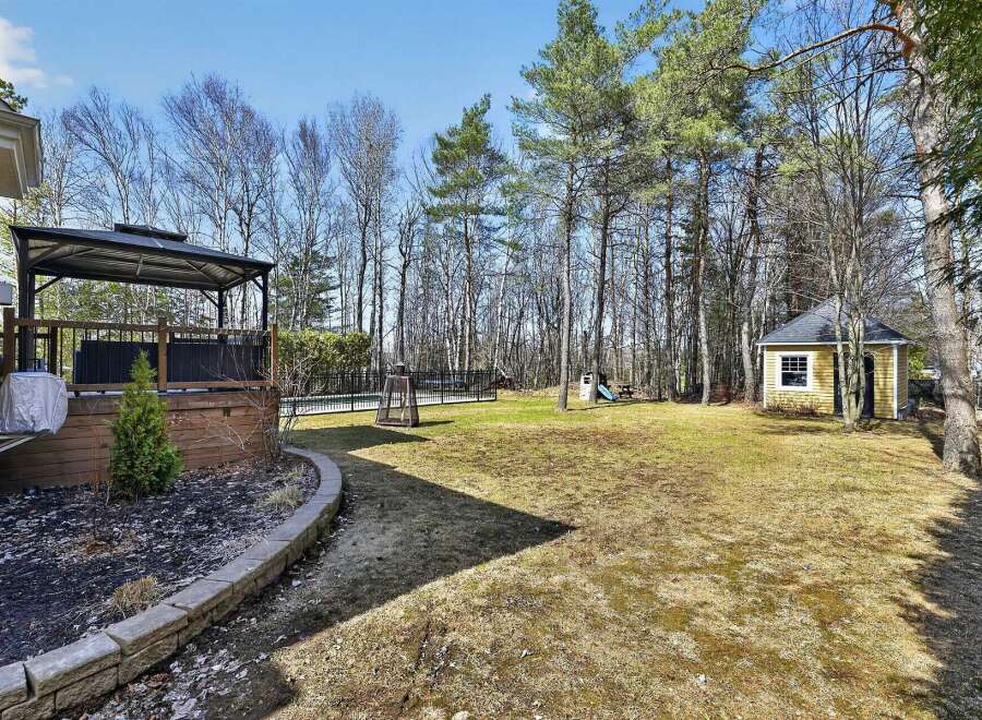 Discover the charm of this property, featuring a beautifully landscaped backyard perfect for relaxation and entertaining.