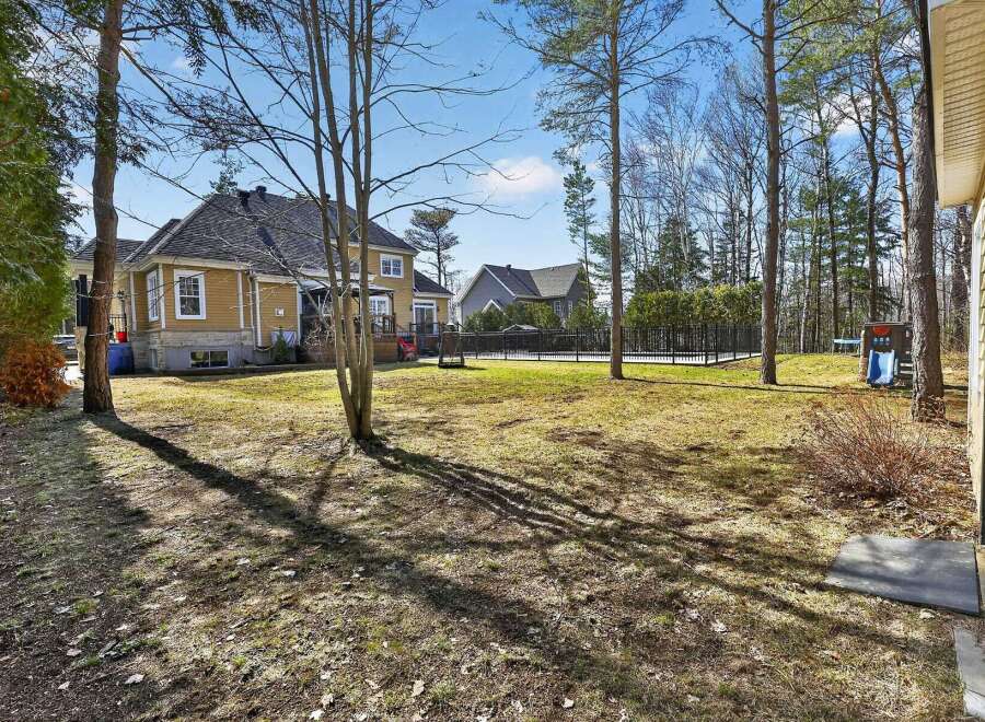 Discover the charm of this stunning property, featuring a spacious backyard perfect for outdoor activities and relaxation.