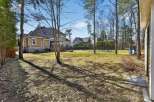 Discover the charm of this stunning property, featuring a spacious backyard perfect for outdoor activities and relaxation.