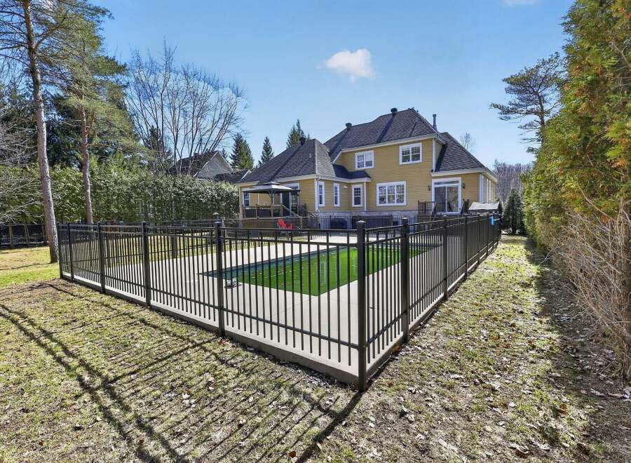 Discover this stunning property featuring a private pool and a beautifully landscaped backyard, perfect for outdoor entertaining.