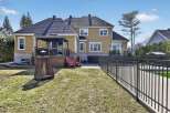 Enjoy outdoor living at its finest with this stunning property featuring a spacious backyard.