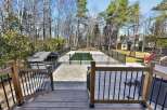 Enjoy luxurious outdoor living with this stunning property featuring a private pool and a spacious deck.