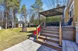 Enjoy outdoor living at its finest with this stunning property featuring a spacious deck and a charming gazebo.