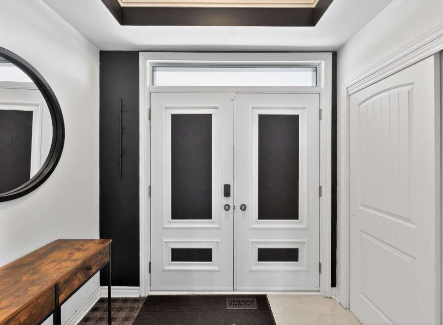 Step into a stunning entryway featuring a modern design.