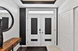Step into a stunning entryway featuring a modern design.