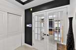 Step into elegance with this stunning property, featuring a bright and airy entryway.