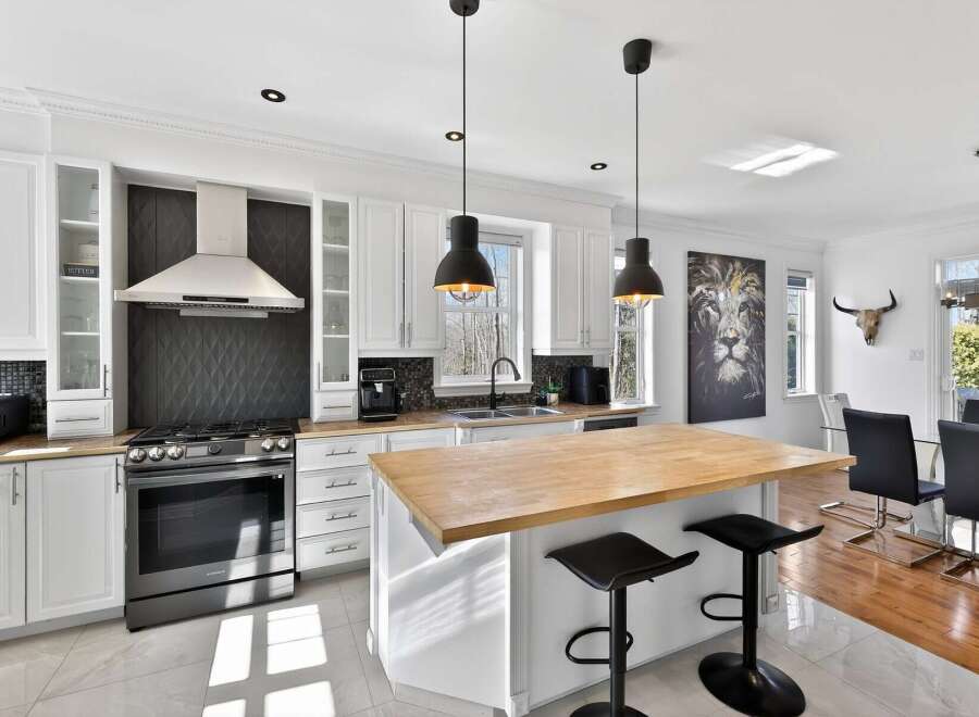 This stunning kitchen boasts modern design and functionality.