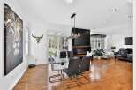 This stunning property boasts a modern dining area, perfect for entertaining guests.