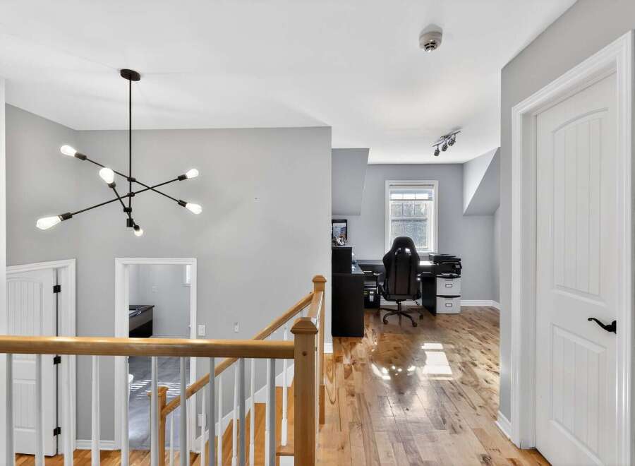 This stunning property boasts a bright and airy interior with hardwood floors throughout.