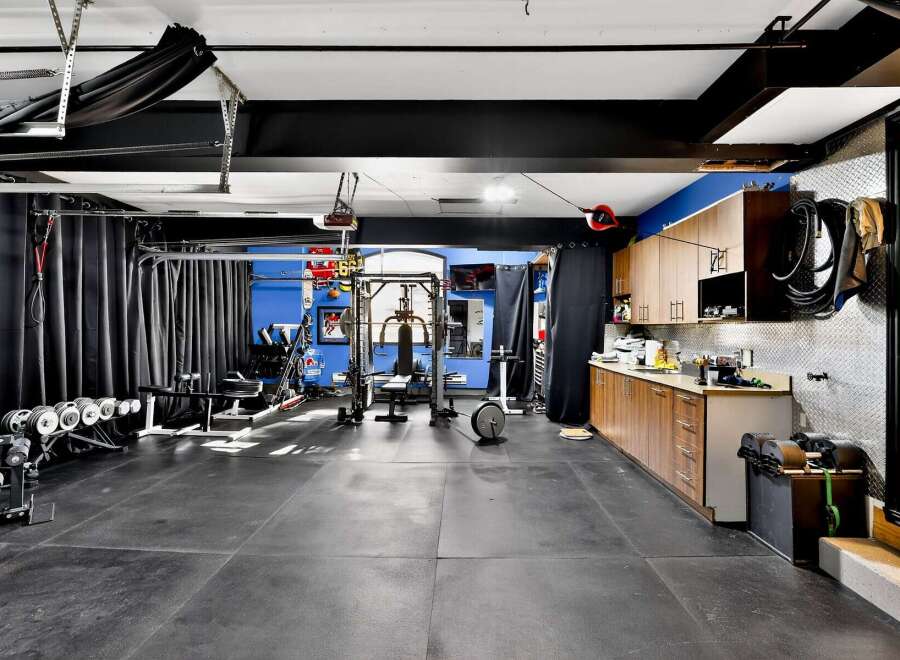 This spacious home gym offers a dedicated space for fitness enthusiasts.