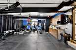 This spacious home gym offers a dedicated space for fitness enthusiasts.