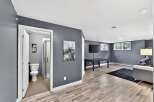 This stunning property boasts a modern interior with a spacious living area and a well-appointed bathroom.
