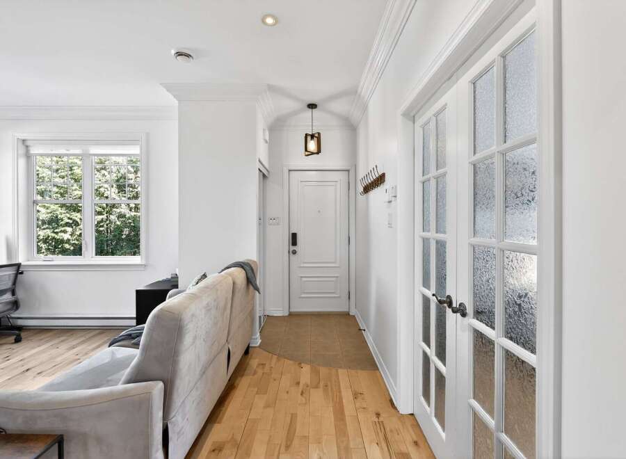 Step into this bright and airy home, featuring a modern design with hardwood floors and ample natural light.