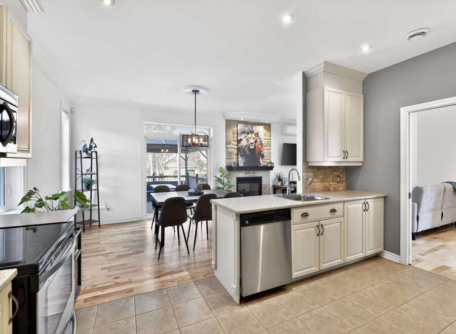 This stunning kitchen boasts modern design with stainless steel appliances and ample counter space.