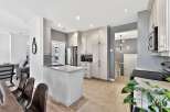 Step into this stunning kitchen, boasting modern design and functionality.