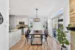 This stunning property boasts a modern dining area, perfect for hosting gatherings.