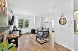 Discover modern living in this stylish property, featuring a bright and airy interior with hardwood floors throughout.