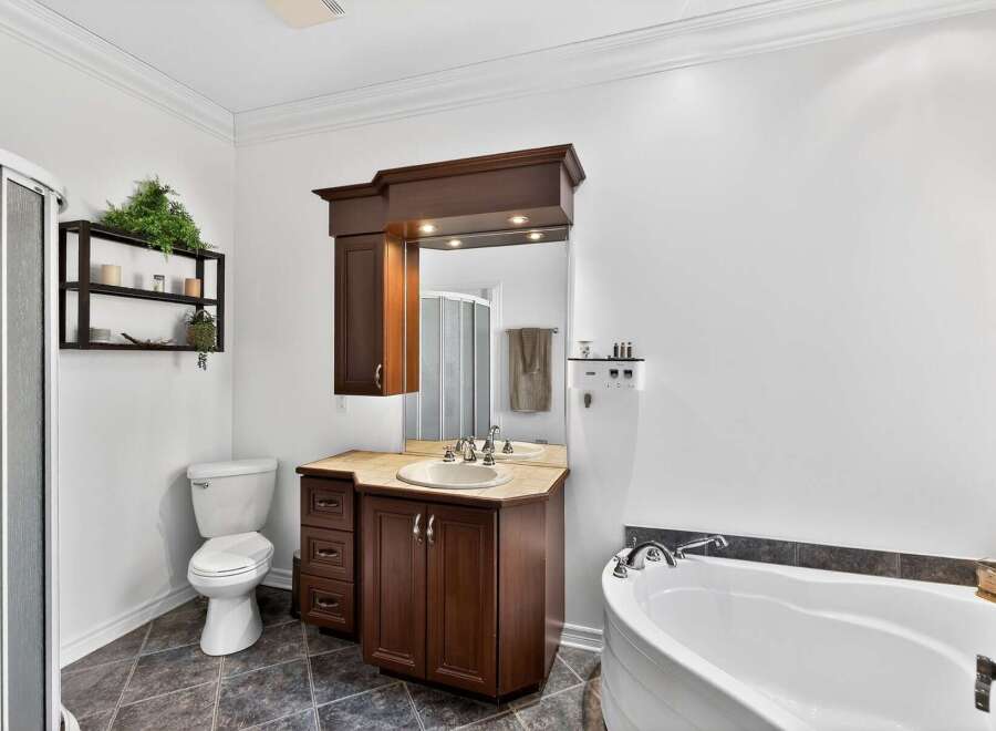 This stunning bathroom boasts a luxurious design with a modern touch.