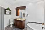 This stunning bathroom boasts a luxurious design with a modern touch.