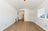 Step into this inviting space with beautiful wood flooring and ample natural light.