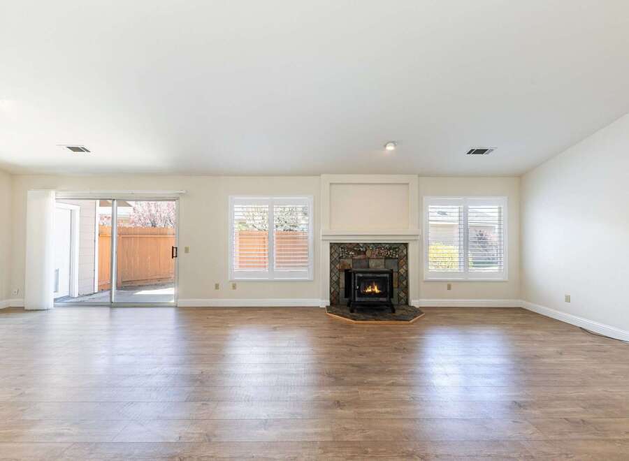 This stunning living room features a cozy fireplace, perfect for those chilly evenings.