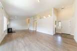 Step into this bright and airy living space, featuring a modern design and ample natural light.