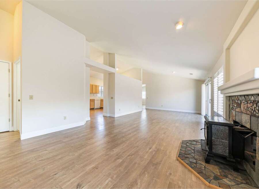 Step into this inviting living space, featuring a modern design and ample natural light.