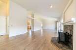 Step into this inviting living space, featuring a modern design and ample natural light.