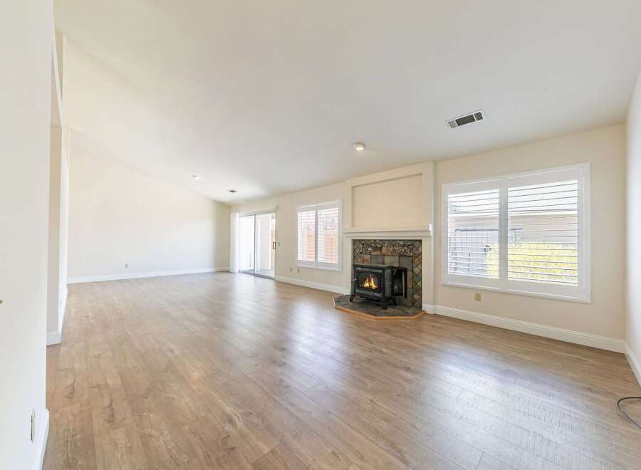 This stunning property boasts a spacious living area with beautiful hardwood floors and an abundance of natural light.