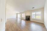 This stunning property boasts a spacious living area with beautiful hardwood floors and an abundance of natural light.