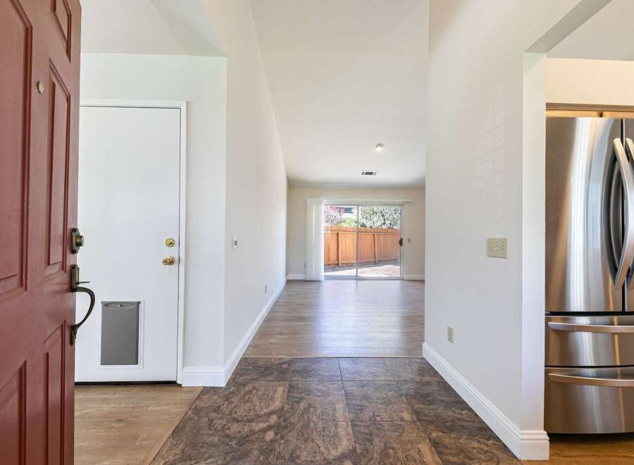 Step into this inviting home and be greeted by a bright and airy entryway.