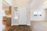 Step into this inviting home and be greeted by a bright and airy entryway.